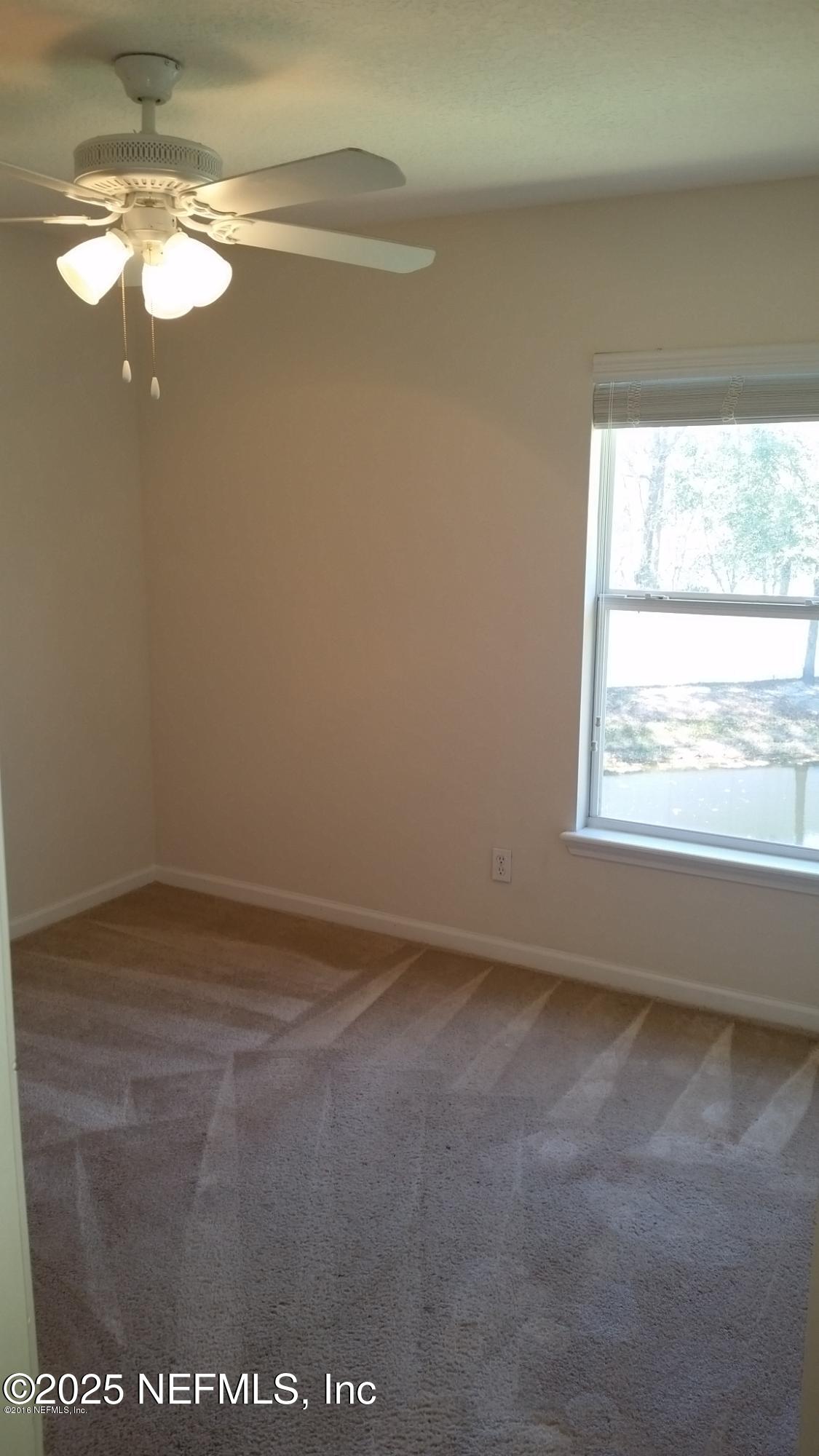 3620 Kirkpatrick Circle, Unit 16 Jacksonville, FL 32210 - Photo 12 of 17 a view of empty room with window