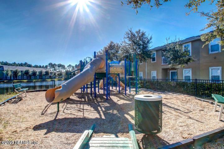 3620 Kirkpatrick Circle, Unit 16 Jacksonville, FL 32210 - Photo 15 of 17 a view of a house with backyard and sitting area