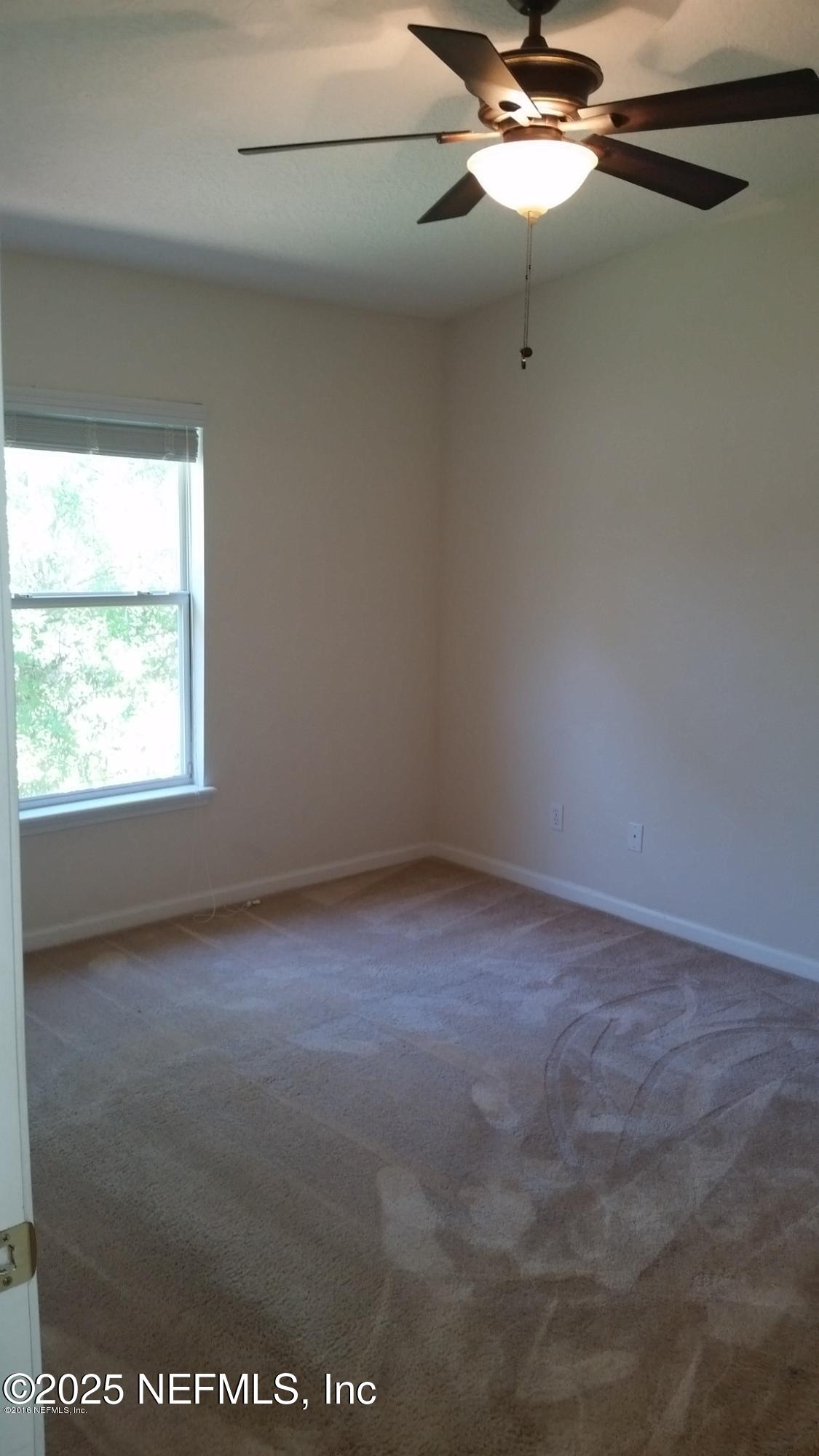 3620 Kirkpatrick Circle, Unit 16 Jacksonville, FL 32210 - Photo 10 of 17 a view of a room with a window