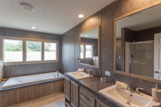 a bathroom with a bathtub sink and toilet