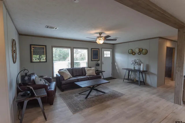 a kitchen with stainless steel appliances granite countertop a stove and a refrigerator