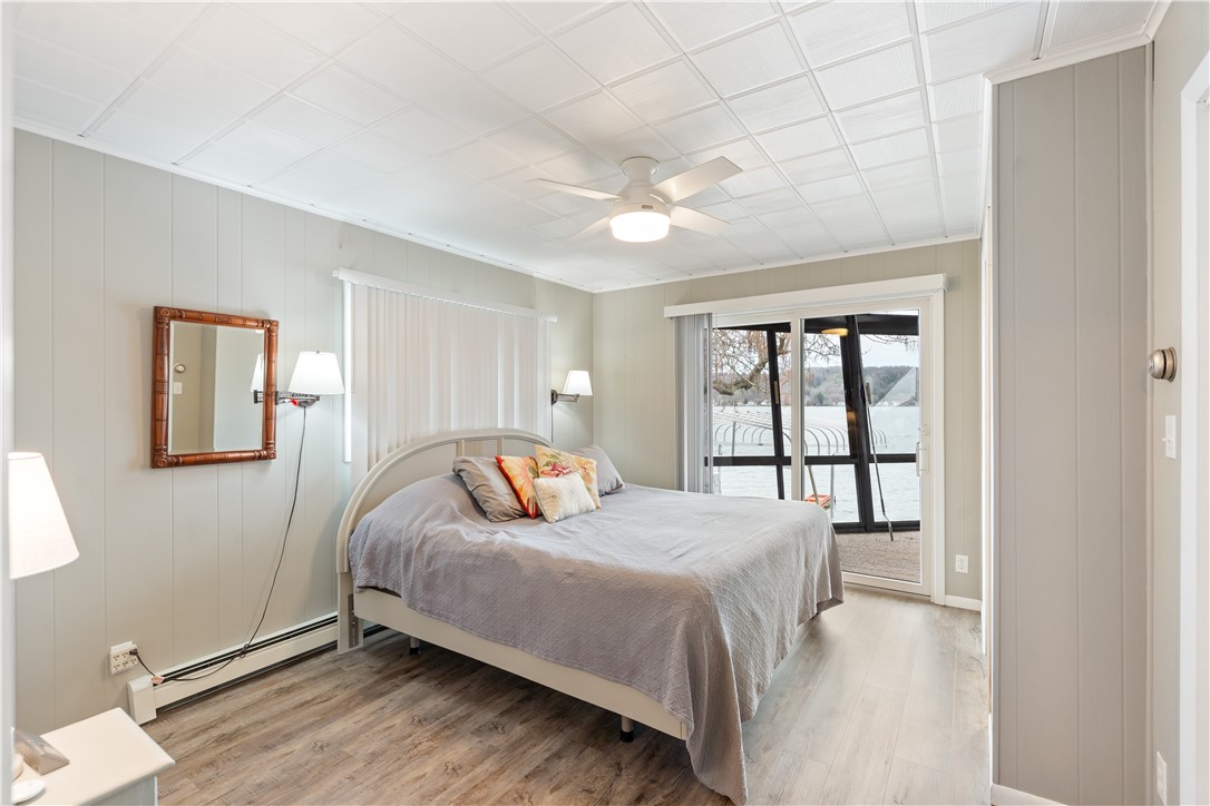 5806 East Lake Road Conesus, NY 14435 - Photo 15 of 36 Primary bedroom with lake views