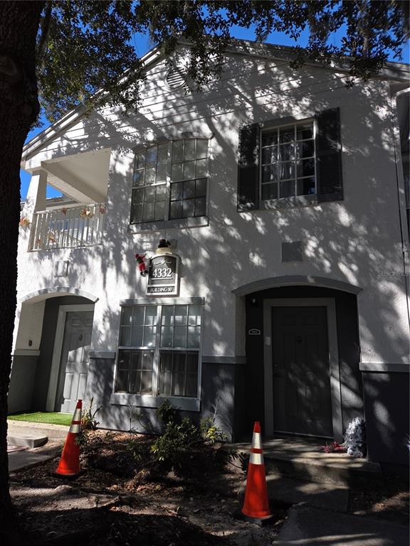 4332 South Kirkman Road, Unit 1006 Orlando, FL 32811 - Photo 1 of 1 a front view of a building