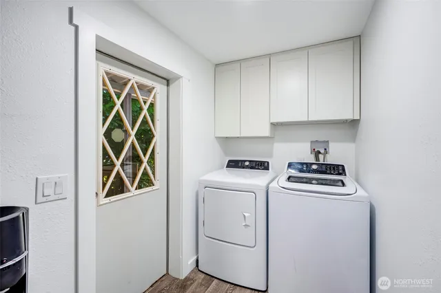 a utility room with dryer and washer