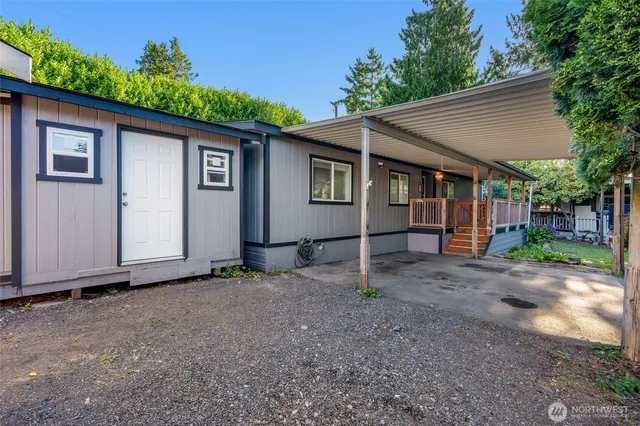 a backyard of a house with lots of green space