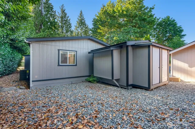 a backyard of a house with lots of green space