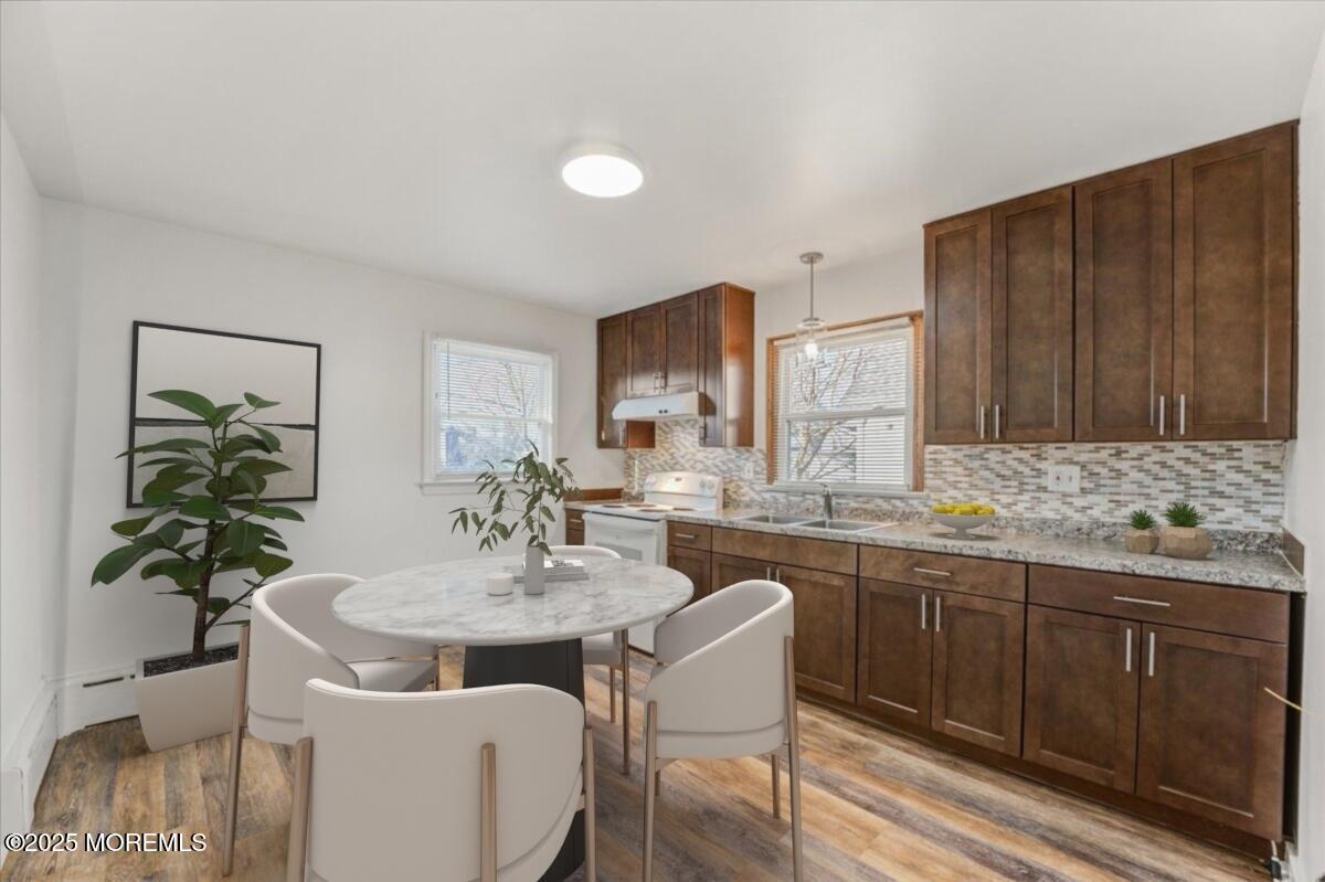 1 Gaston Avenue, Unit UPSTAIRS Raritan, NJ 08869 - Photo 2 of 11 a kitchen with a sink and cabinets