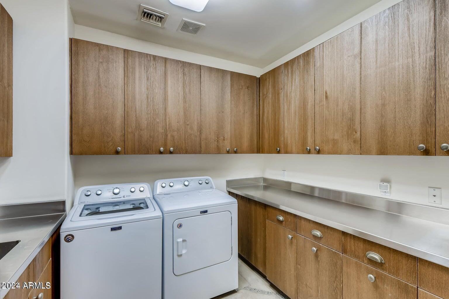 7475 East Gainey Ranch Road, Unit 26 Scottsdale, AZ 85258 - Photo 24 of 25 Laundry Room Downstairs