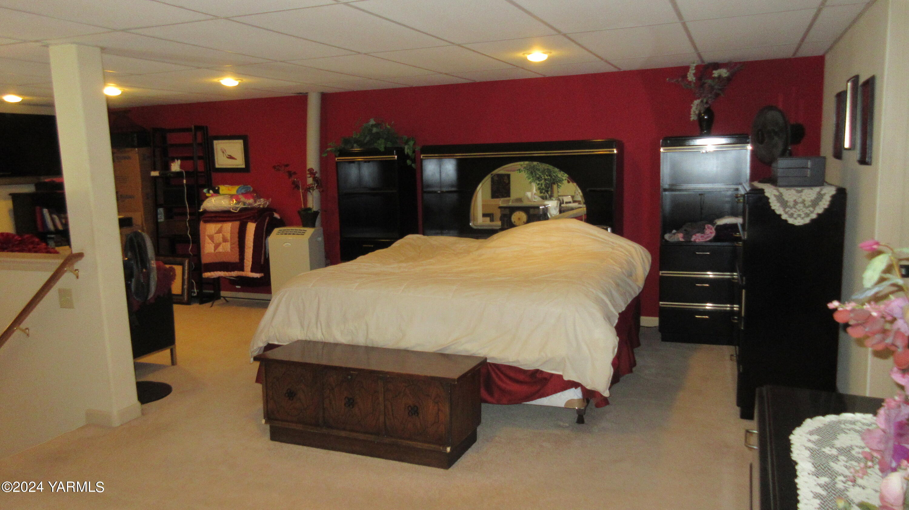 455 Rosenkranz Road Tieton, WA 98947 - Photo 7 of 14 a bed room with a bed and a television