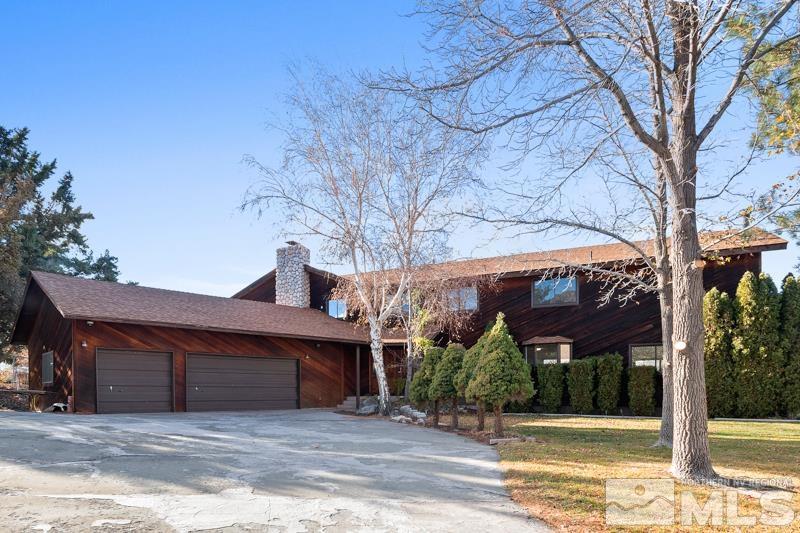 7270 Pembroke Drive Reno, NV 89502 - Photo 1 of 38 a view of a house with a yard