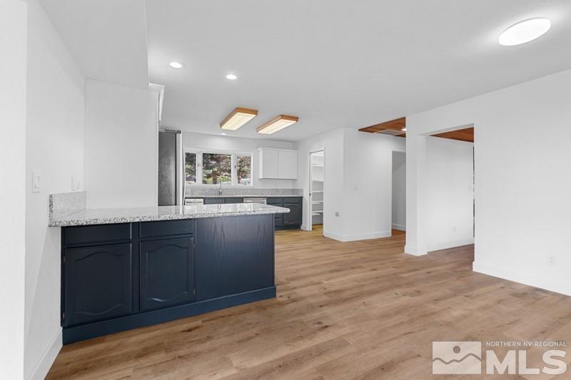 7270 Pembroke Drive Reno, NV 89502 - Photo 13 of 38 a view of kitchen with wooden floor