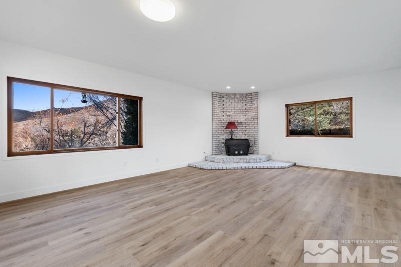 7270 Pembroke Drive Reno, NV 89502 - Photo 15 of 38 a view of a big room with wooden floor and window