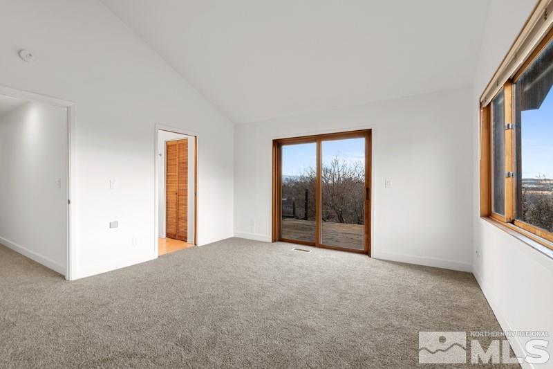 7270 Pembroke Drive Reno, NV 89502 - Photo 20 of 38 a view of an empty room with window and bathroom