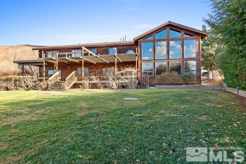 7270 Pembroke Drive Reno, NV 89502 - Photo 2 of 38 a view of a front of a house with a yard