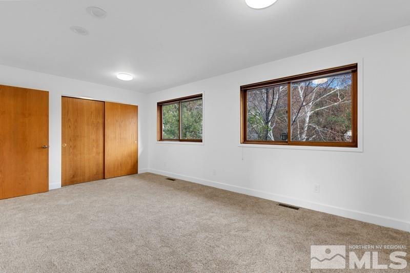 7270 Pembroke Drive Reno, NV 89502 - Photo 24 of 38 a view of an empty room with a window