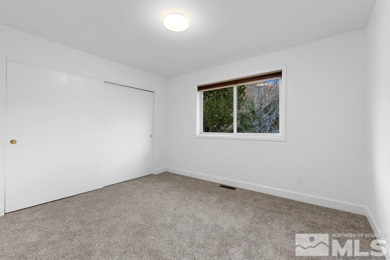 7270 Pembroke Drive Reno, NV 89502 - Photo 25 of 38 an empty room with a window