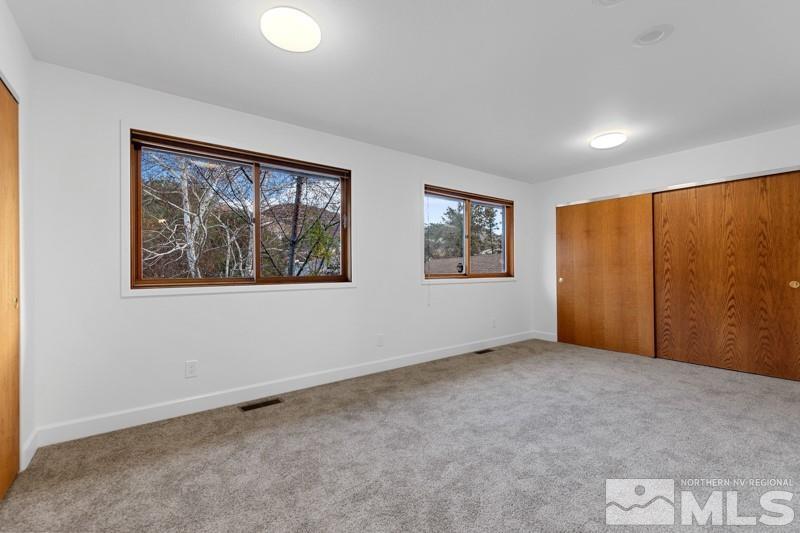7270 Pembroke Drive Reno, NV 89502 - Photo 26 of 38 a view of an empty room with a window