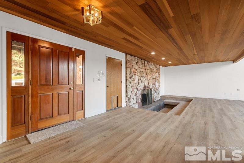 7270 Pembroke Drive Reno, NV 89502 - Photo 5 of 38 a view of empty room with wooden floor