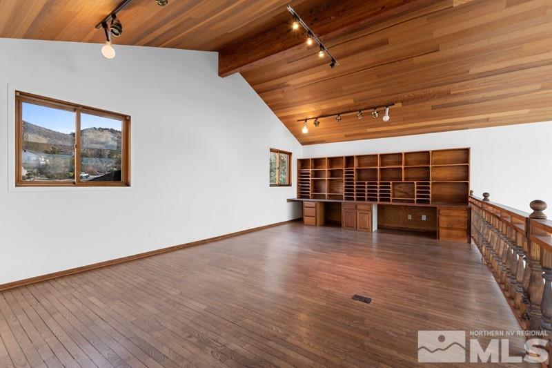 7270 Pembroke Drive Reno, NV 89502 - Photo 9 of 38 a view of empty room with wooden floor