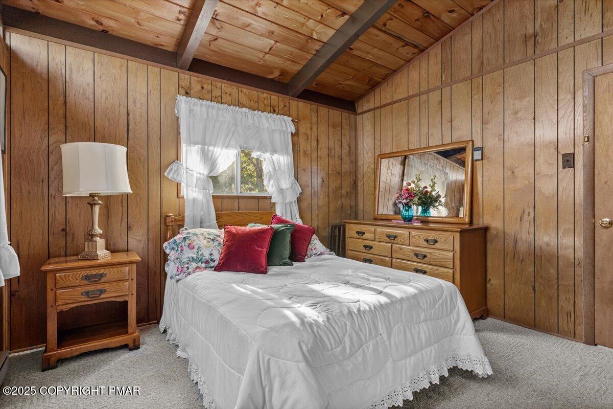 652 Rimrock Road Bartonsville, PA 18321 - Photo 10 of 37 a bedroom with a bed and a mirror