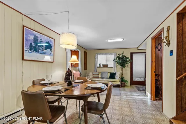 a room with furniture mirror and window