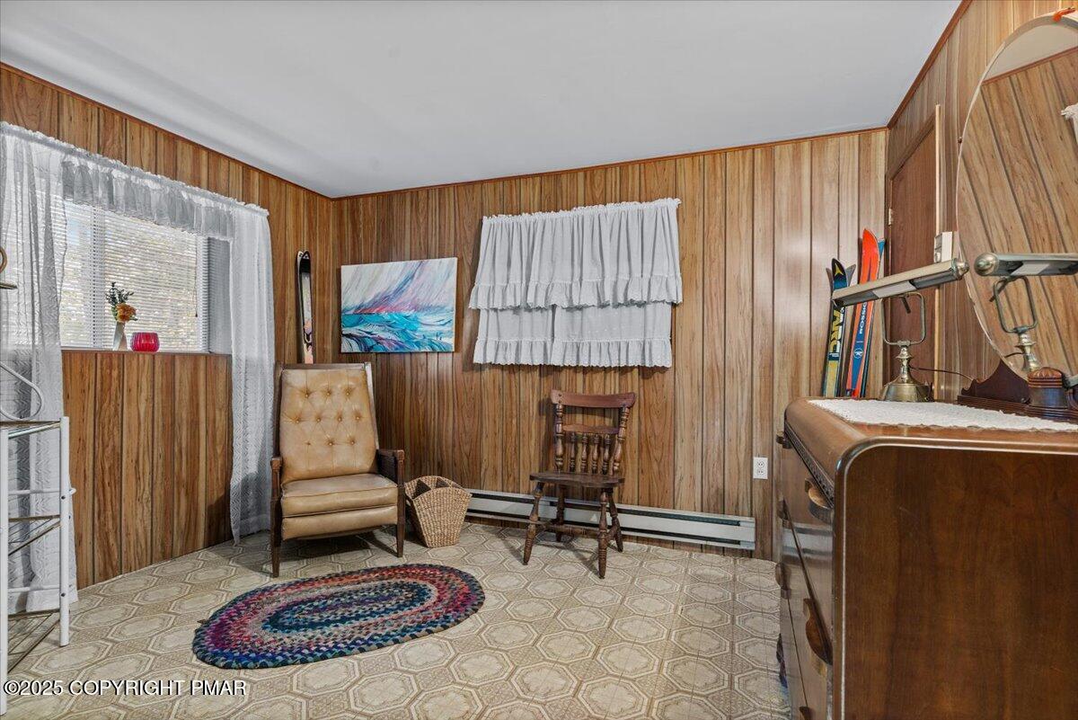 652 Rimrock Road Bartonsville, PA 18321 - Photo 21 of 37 a living room with furniture a rug and a fireplace
