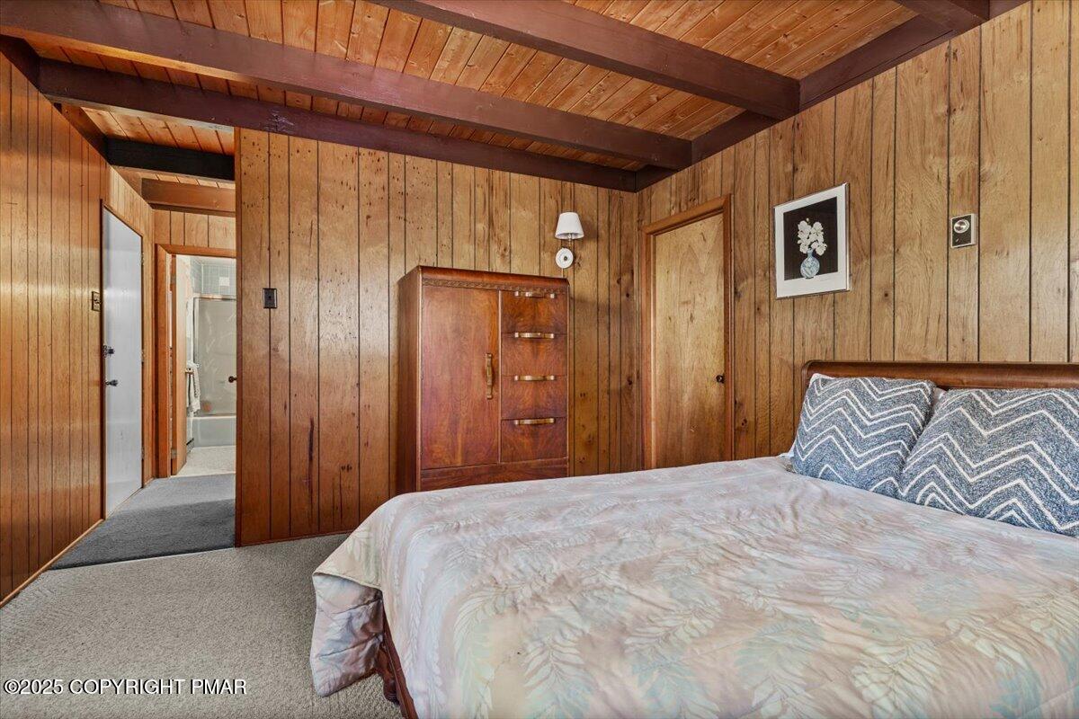 652 Rimrock Road Bartonsville, PA 18321 - Photo 24 of 37 a bedroom with a large bed and a mirror