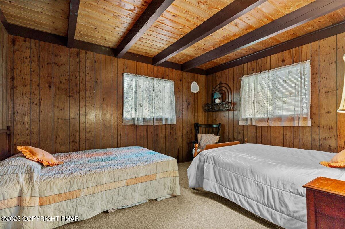 652 Rimrock Road Bartonsville, PA 18321 - Photo 26 of 37 a bedroom with a bed and a large window