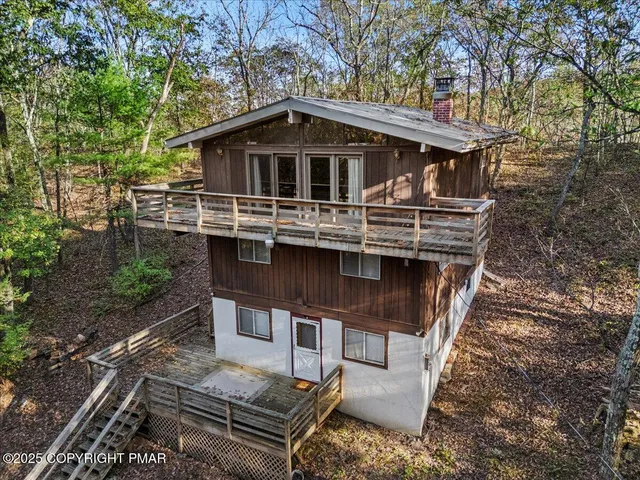 a house with trees in front of it