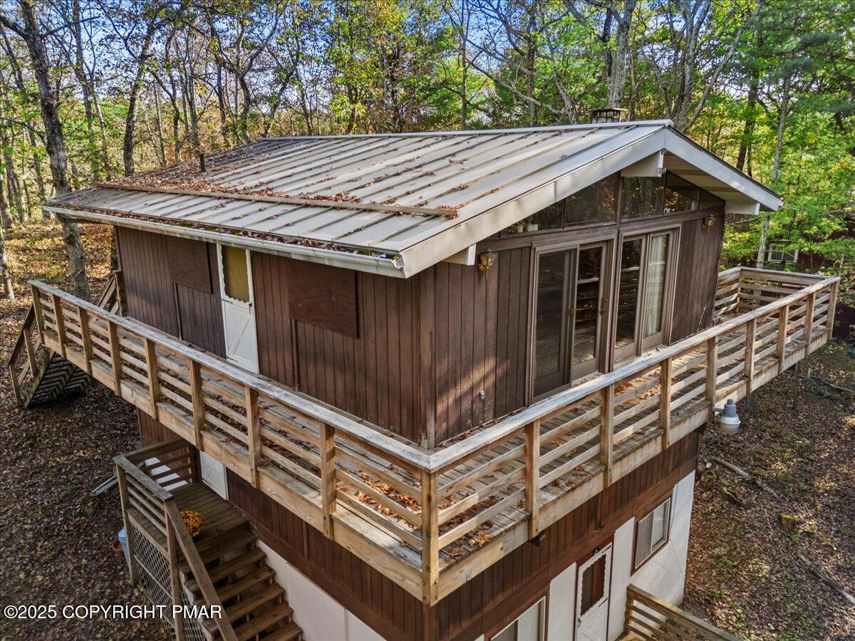 652 Rimrock Road Bartonsville, PA 18321 - Photo 33 of 37 a view of house with backyard and trees