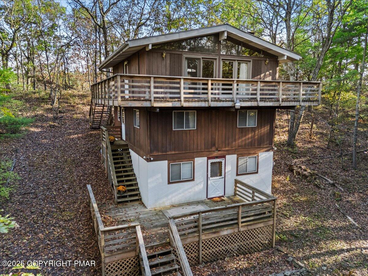 652 Rimrock Road Bartonsville, PA 18321 - Photo 35 of 37 a front view of a house with balcony