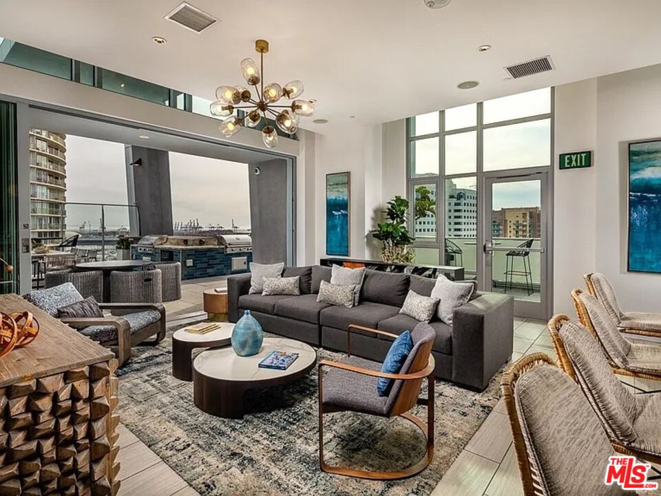 707 East Ocean Boulevard, Unit 1517 Long Beach, CA 90802 - Photo 18 of 21 a living room with furniture and a large window