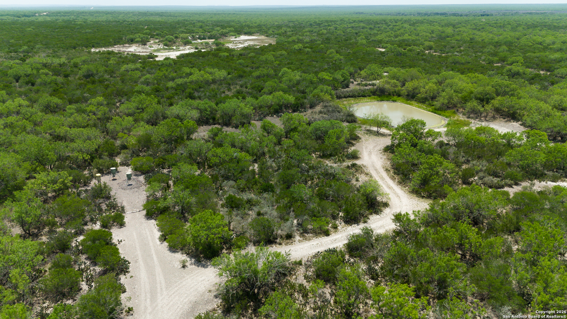 Tbd Old San Diego Road Tilden, TX 78072 - Photo 17 of 23 an aerial view of residential houses with outdoor space and trees