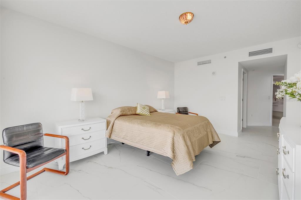 231 Riverside Drive, Unit 7091 Daytona Beach, FL 32117 - Photo 29 of 90 a bedroom with a bed and a window