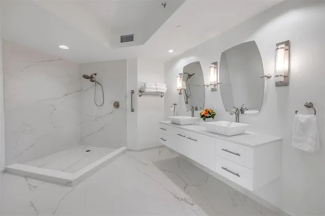 a view of swimming pool with outdoor seating and city view