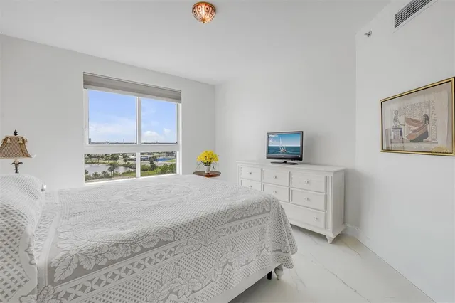 a media room with lots of chairs and a projector