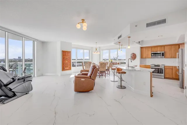a living room with furniture and a table