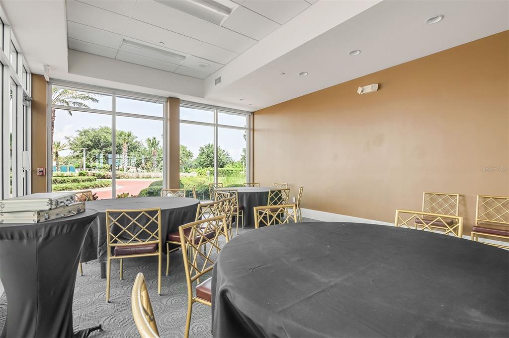 231 Riverside Drive, Unit 7091 Daytona Beach, FL 32117 - Photo 75 of 90 a view of a dining room with furniture window and outside view