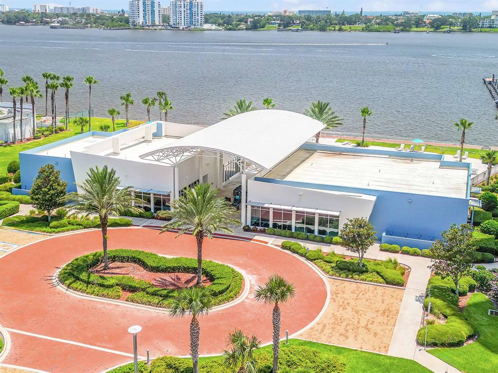 231 Riverside Drive, Unit 7091 Daytona Beach, FL 32117 - Photo 90 of 90 a view of a house with a yard and sitting area