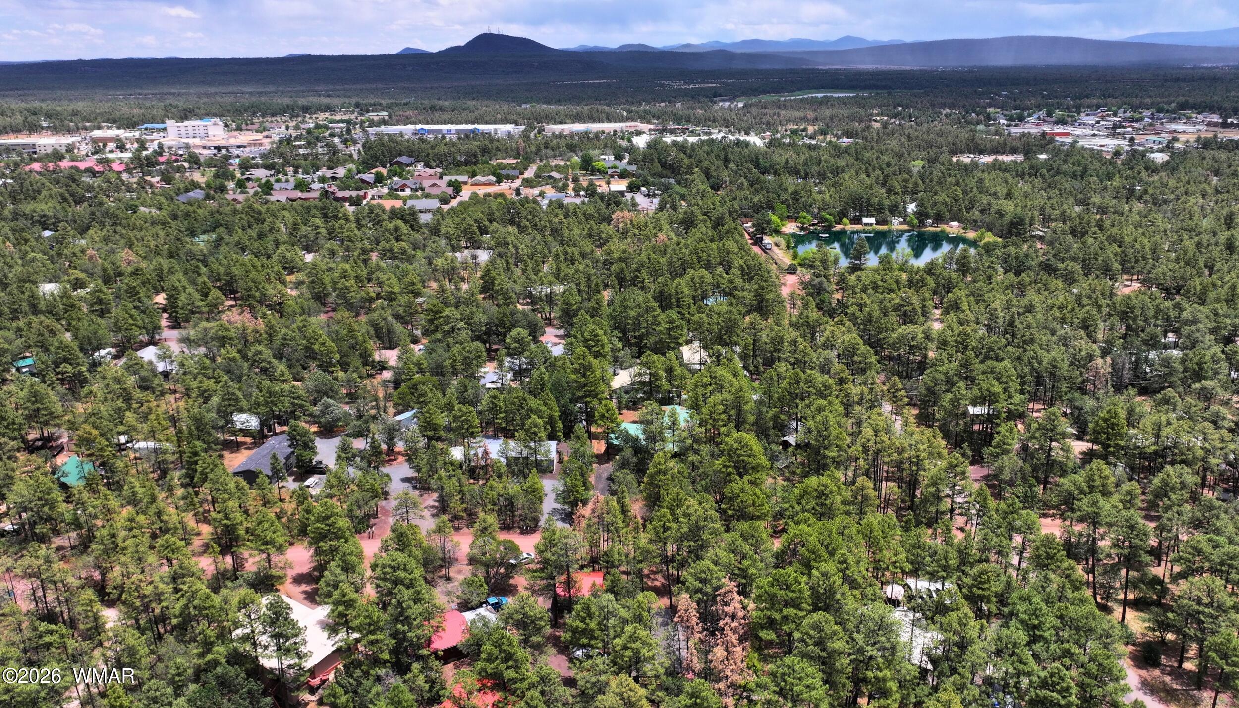 6448 Lower Ridge Drive Lakeside, AZ 85929 - Photo 23 of 24 a view of a city with lush green forest