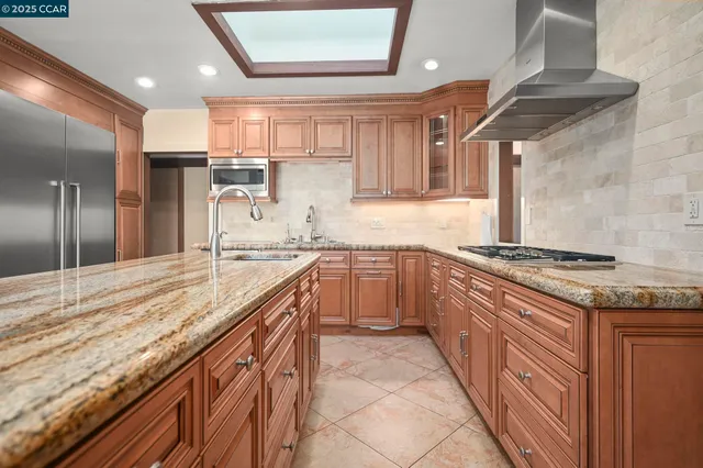 a view of a room that has a large window