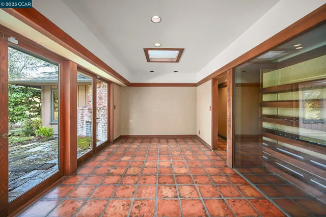 a bathroom with a shower sink and mirror