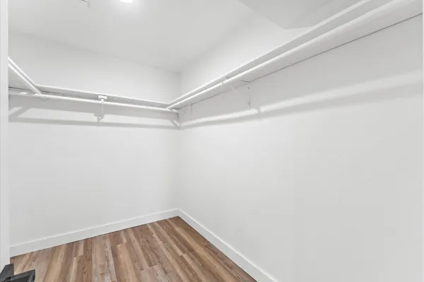 a view of a room with racks on the wall