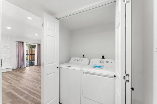 a utility room with dryer and washer