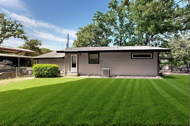a house view with a garden space