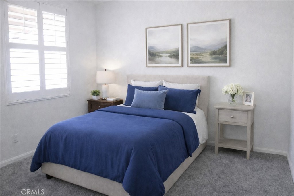 1285 Fools Gold Way, Unit 2 Chula Vista, CA 91913 - Photo 18 of 43 a bedroom with a bed and a window