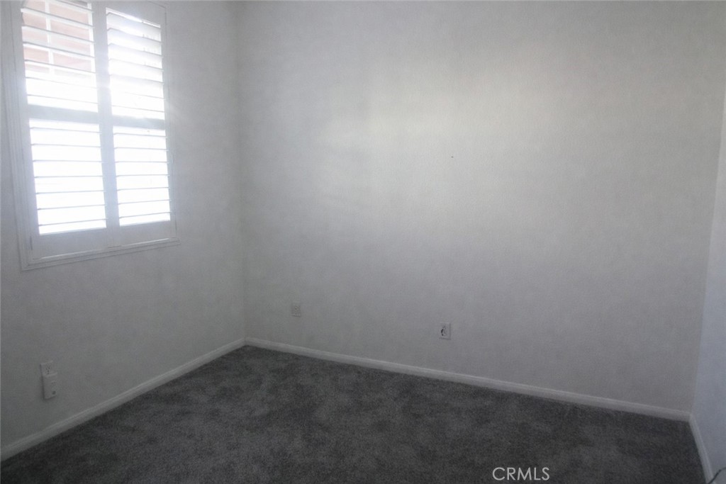 1285 Fools Gold Way, Unit 2 Chula Vista, CA 91913 - Photo 19 of 43 an empty room with a window