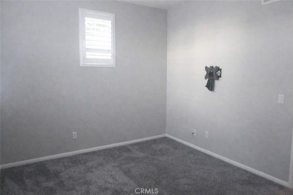 1285 Fools Gold Way, Unit 2 Chula Vista, CA 91913 - Photo 21 of 43 an empty room with a window