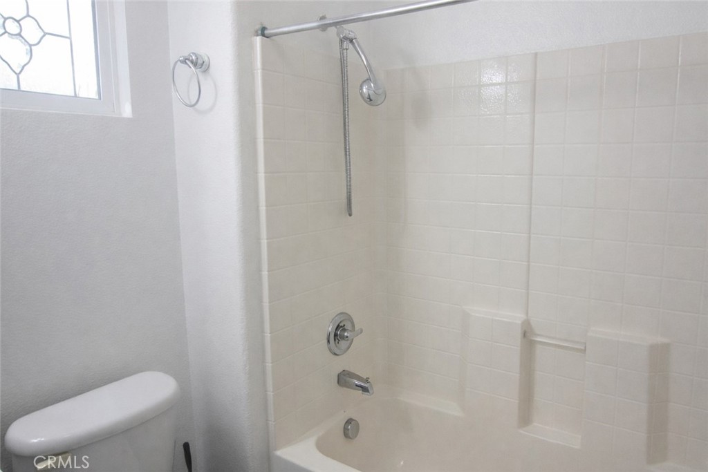 1285 Fools Gold Way, Unit 2 Chula Vista, CA 91913 - Photo 25 of 43 a bathroom with a shower and a toilet