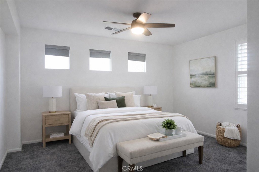 1285 Fools Gold Way, Unit 2 Chula Vista, CA 91913 - Photo 29 of 43 a bedroom with a bed and a window